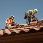 Roofers Working on Clay Tile Roof